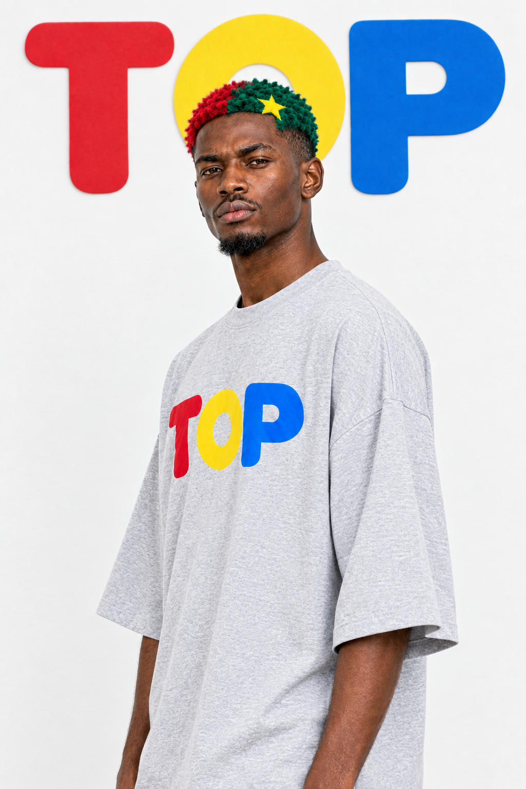 Grey TOP tee three-quarter pose with serious direct gaze