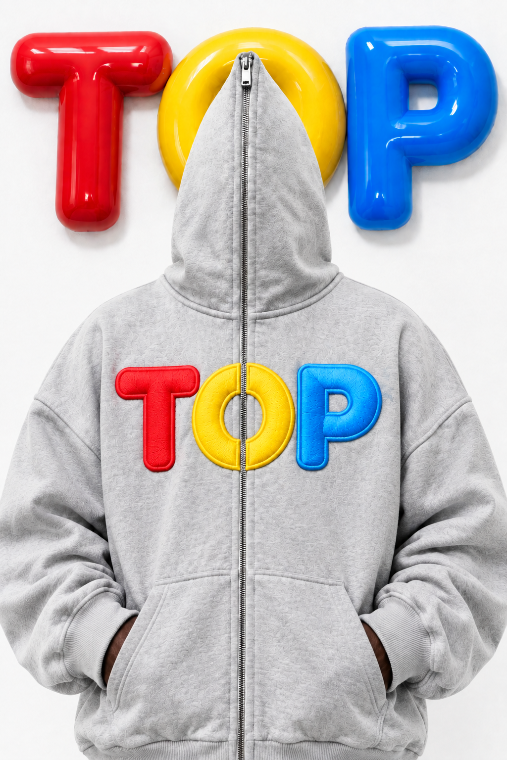 Grey TOP zip hoodie mystery shot, same crop, glossy TOP wall